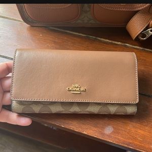 Brown Coach folding wallet